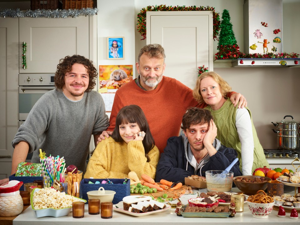 The cast of *Outnumbered* in a Christmas kitchen scene.