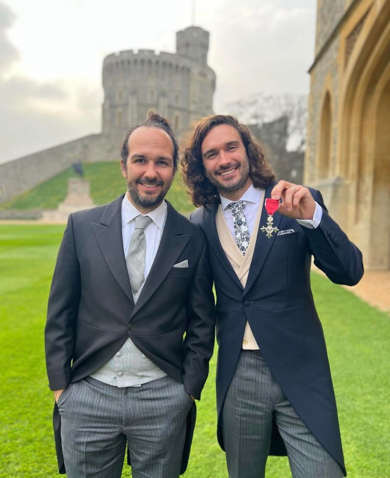 Joe, pictured with brother Nikki, was awarded an MBE in October 2020 for his daily live 'PE' workouts during lockdown which kept the nation moving