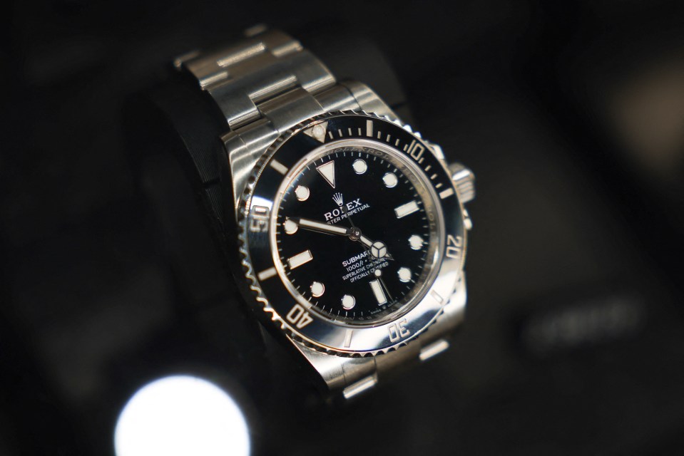 Pre-owned Rolex Submariner watch.