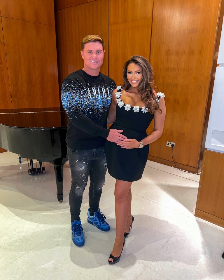 Pregnant Charlotte Dawson and her fiancé celebrate her birthday.