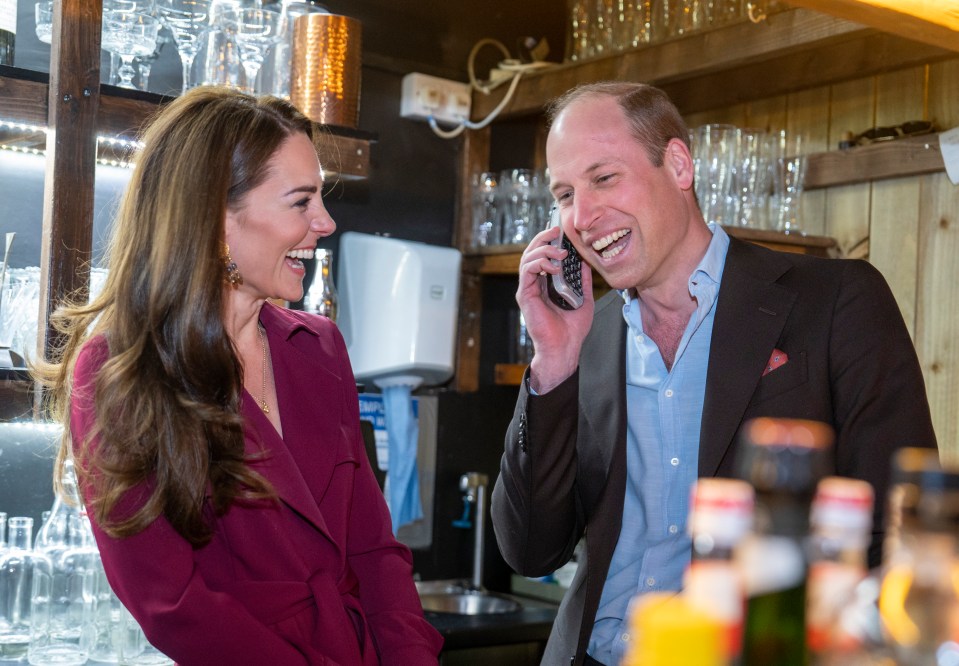 The Prince and Princess of Wales at an Indian restaurant.