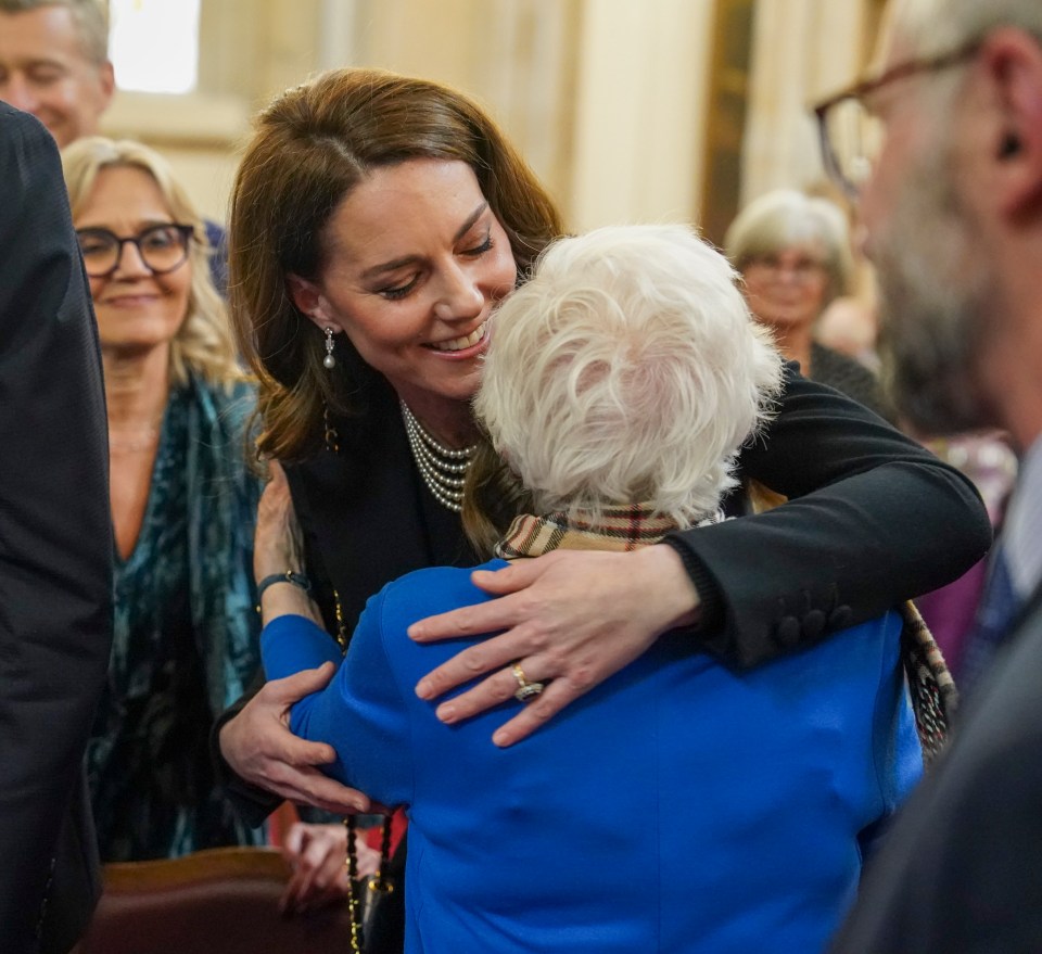 Kate Middleton hugging a Holocaust survivor at a Holocaust Memorial Day ceremony.