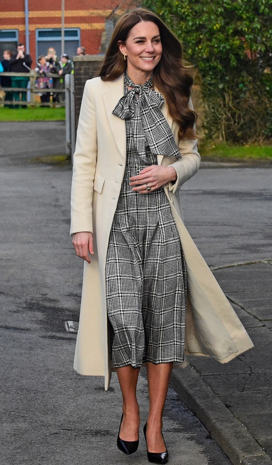 The Princess of Wales visiting a textile manufacturer.