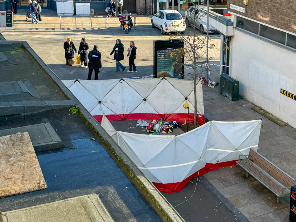 Crime scene privacy tent at a Bedford bus station.