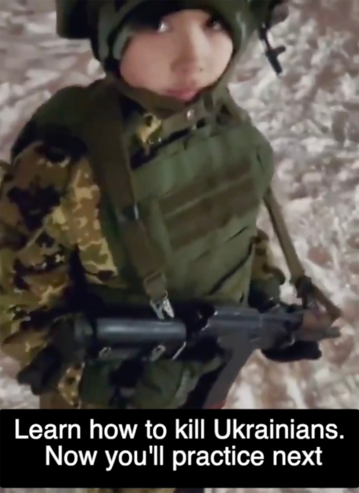 A young child in military uniform holds a rifle.  Text overlay reads, "Learn how to kill Ukrainians. Now you'll practice next."