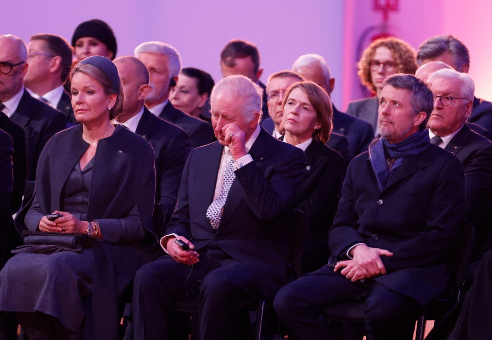 King Charles III and Queen Mathilde of Belgium at a commemoration.