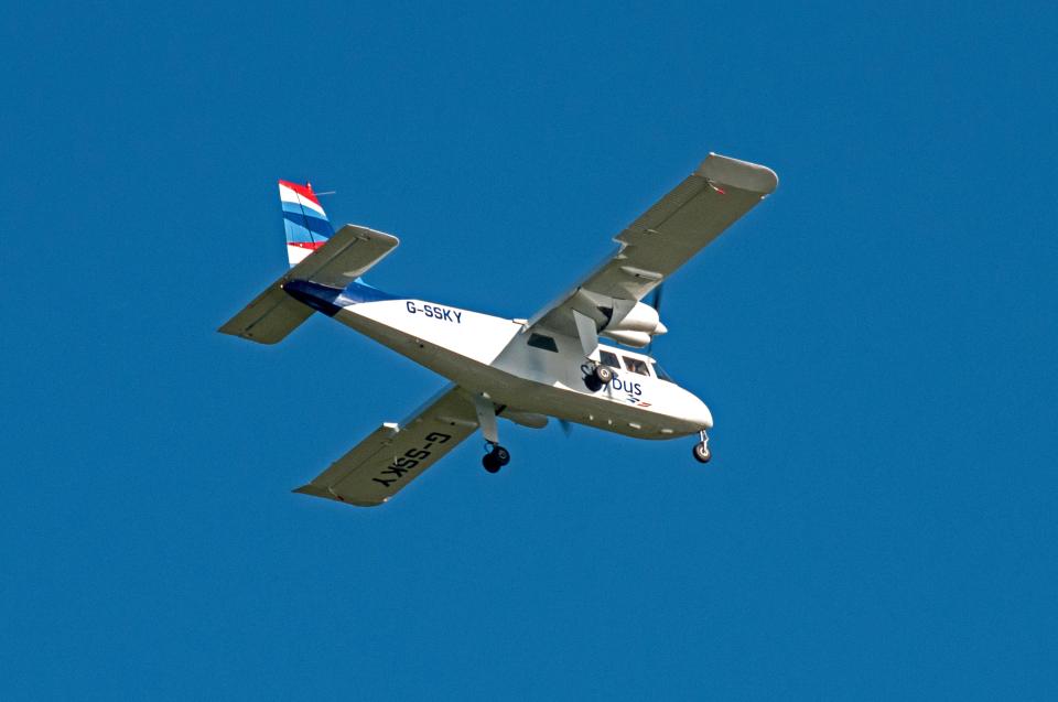 Skybus airplane in flight.