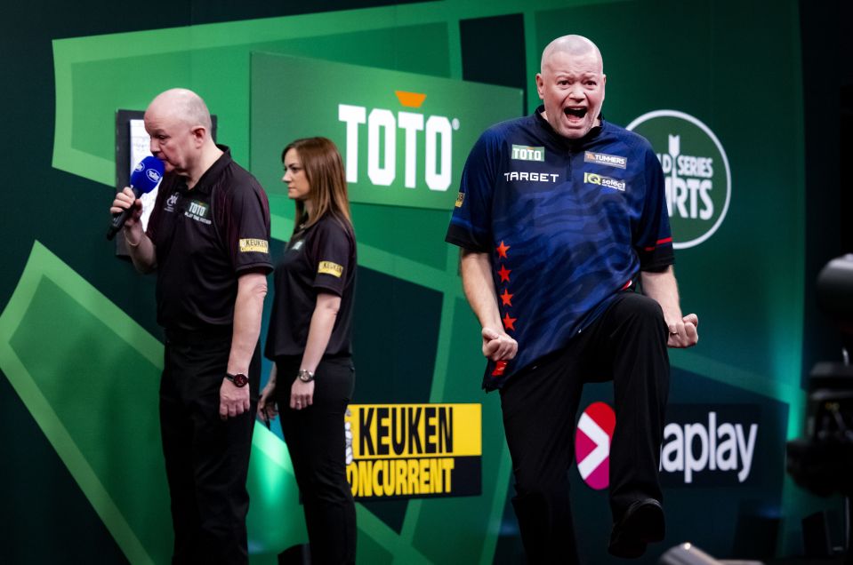 Raymond van Barneveld celebrating at the Dutch Darts Masters.