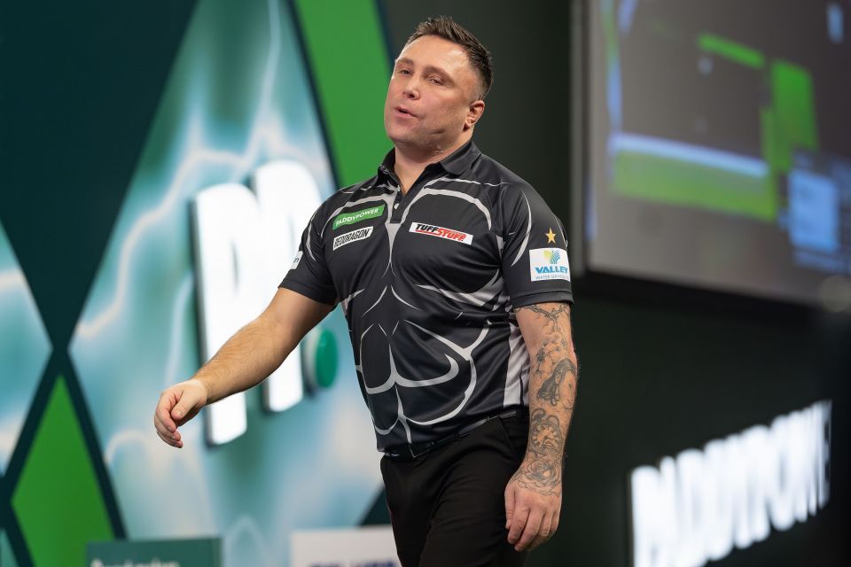 Gerwyn Price reacting during a World Darts Championship quarter-final match.