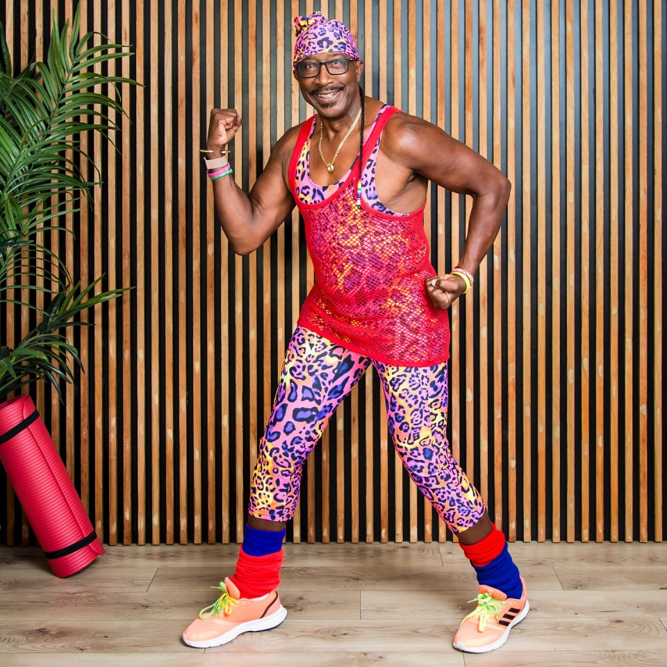 Mr. Motivator demonstrating home maintenance-inspired yoga poses.