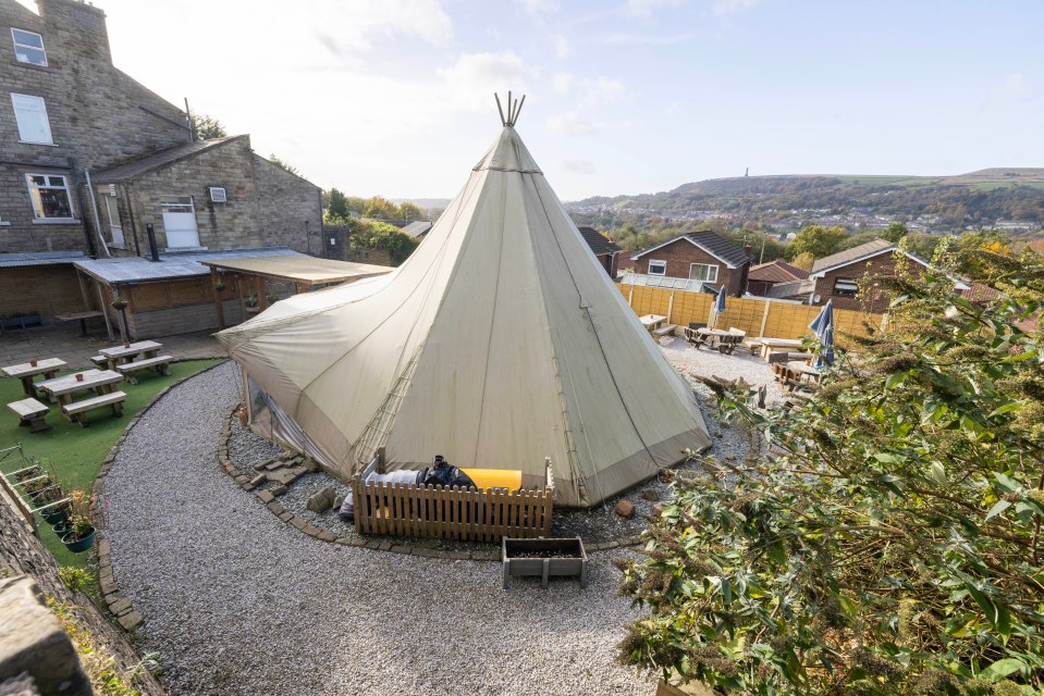 Teepee in pub garden.