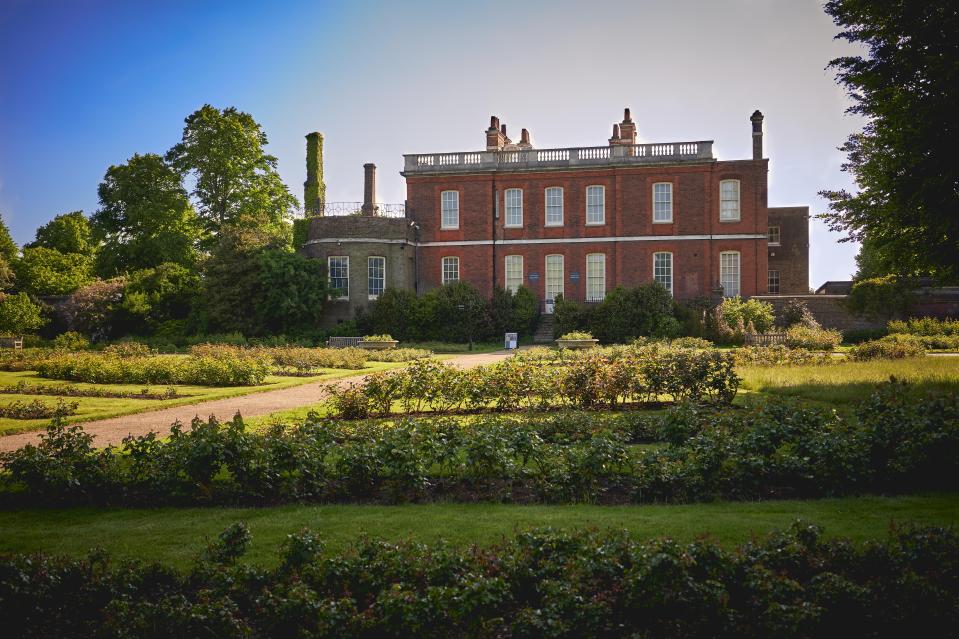 Ranger's House, a red brick Georgian mansion, situated in a garden.