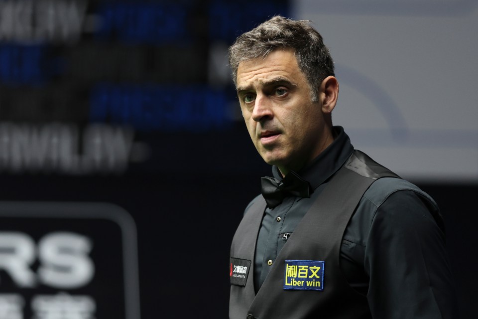 Ronnie O'Sullivan reacting during a snooker match.