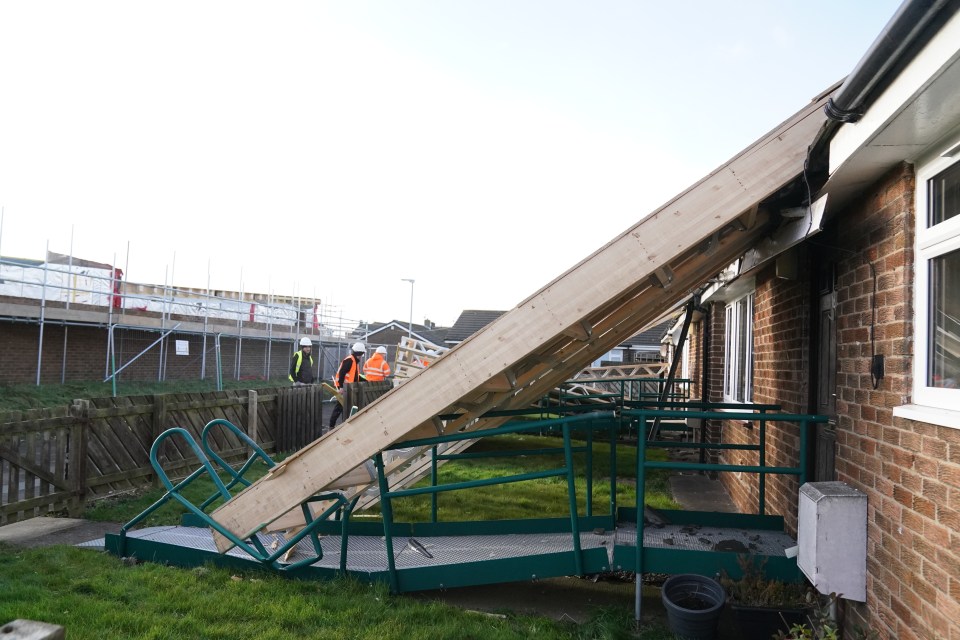 Roof blown off a house by strong winds.