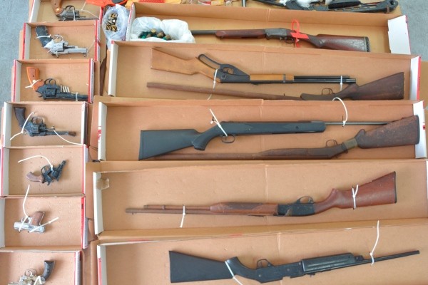 Several firearms and ammunition confiscated by the Royal Cayman Islands Police Service.