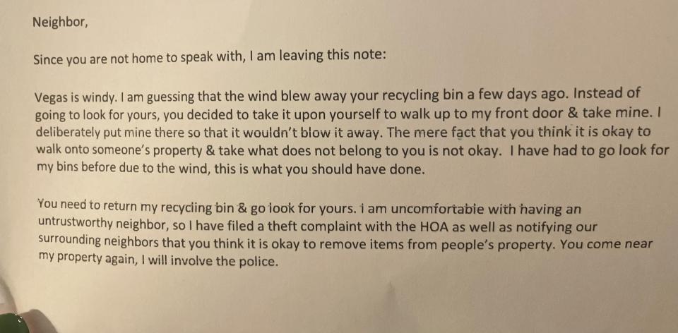 Angry note accusing neighbor of stealing recycling bin and threatening police involvement.