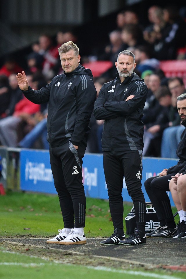 Ryan Giggs and Karl Robinson, Salford City joint owner and head coach, on the sidelines.