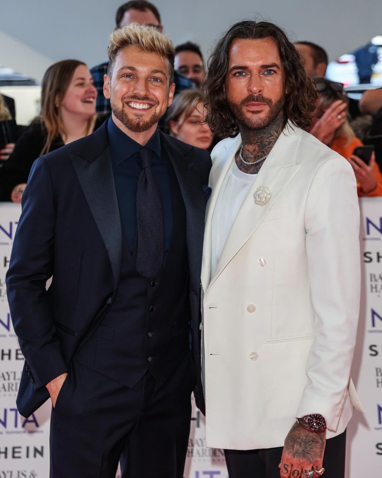 Sam Thompson and Pete Wicks at an awards ceremony.