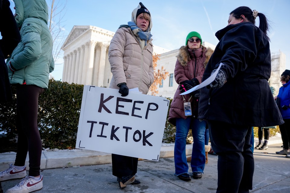 Protestors outside the Supreme Court hold a sign that reads "Keep TikTok."