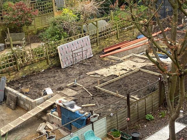 Construction site in a residential backyard.