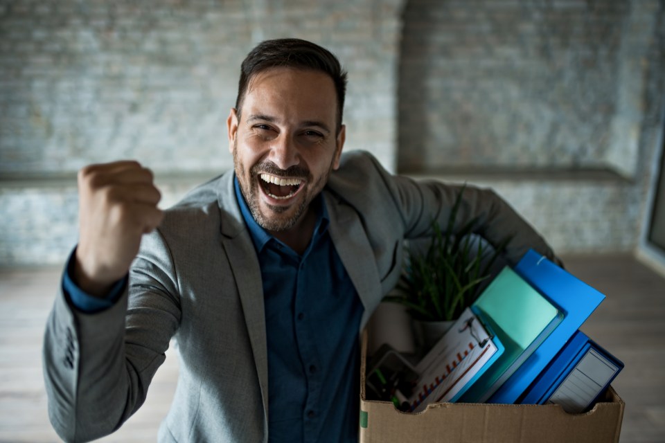 Happy businessman on his first day at a new office.