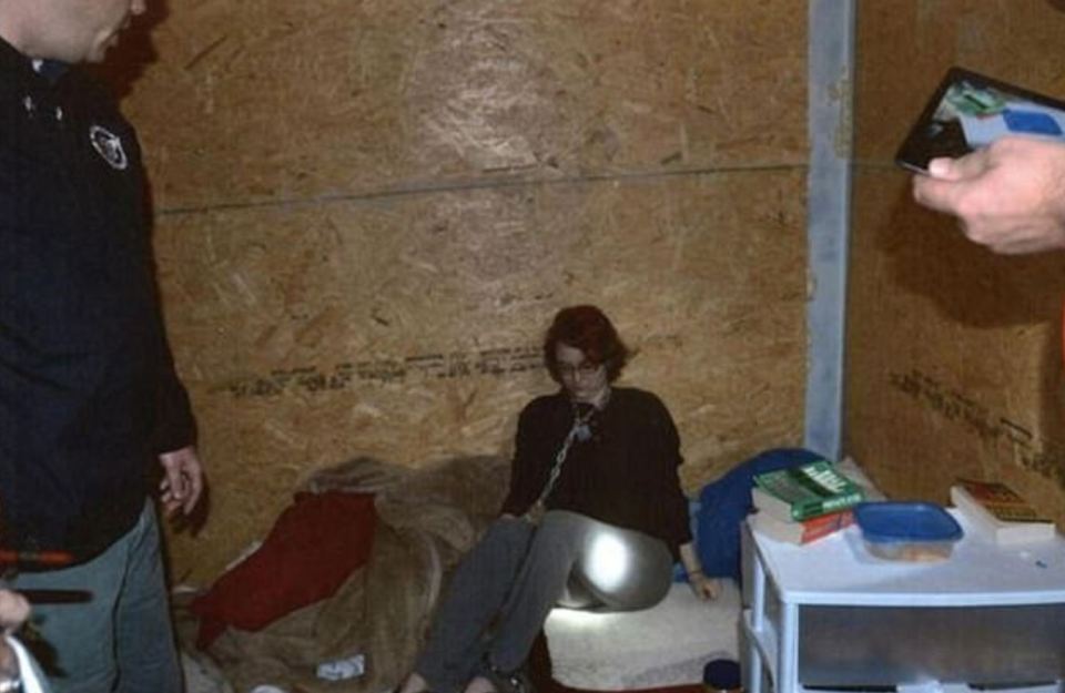 Kala Brown, chained inside a shipping container.