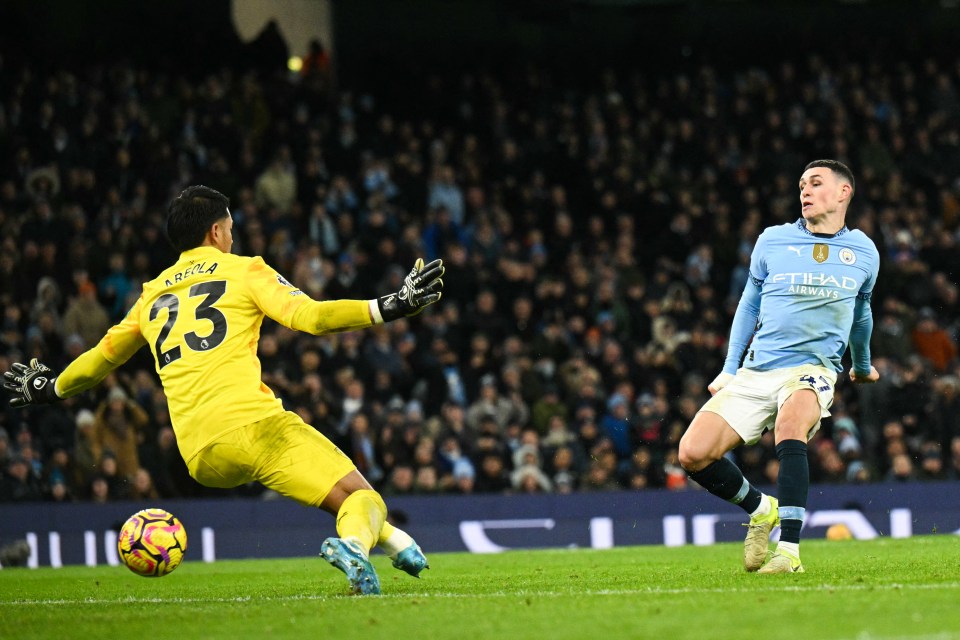 Phil Foden scoring a goal for Manchester City.