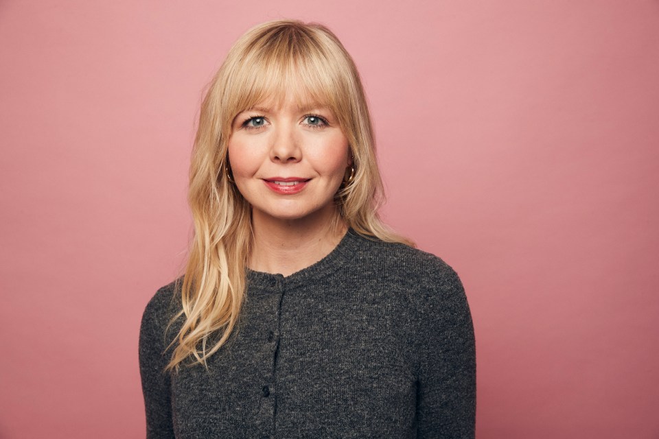 Portrait of a woman with blonde hair.