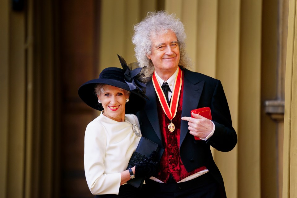 Sir Brian May and his wife Anita Dobson at Buckingham Palace after he was knighted.