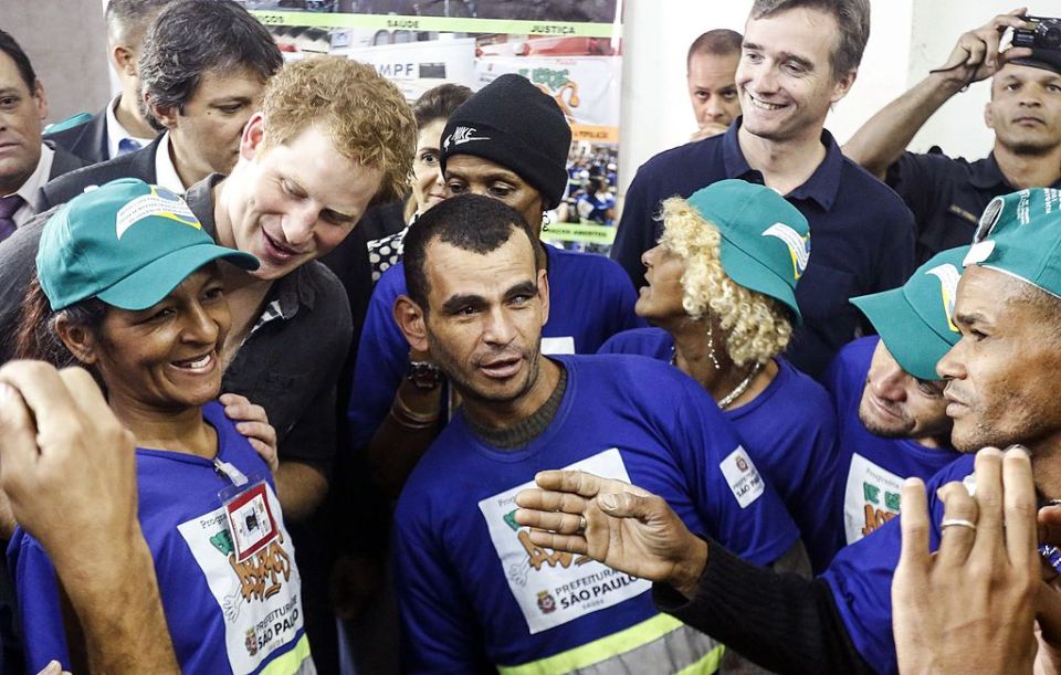 Prince Harry speaks with residents of Cracolandia, a poor Sao Paulo neighborhood.