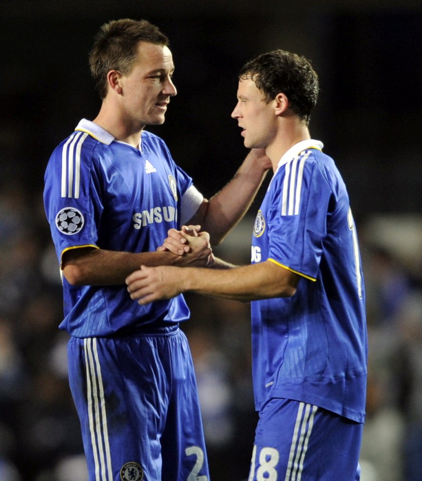 John Terry and Wayne Bridge celebrating after a Chelsea soccer match.