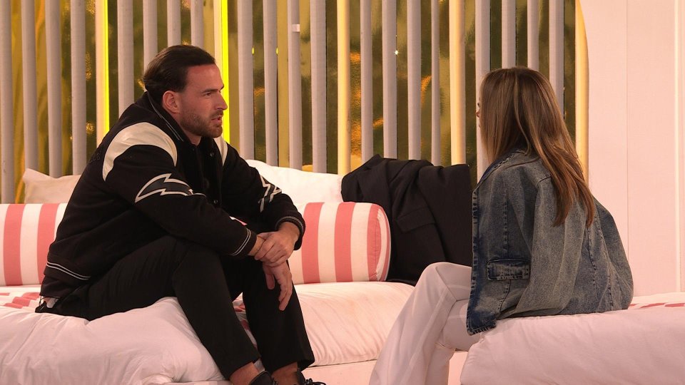 Ronnie and Elma from Love Island: All Stars having a conversation.