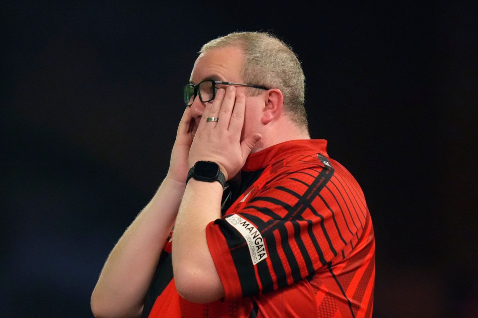 Stephen Bunting of England reacts during a World Darts Championship semifinal match.