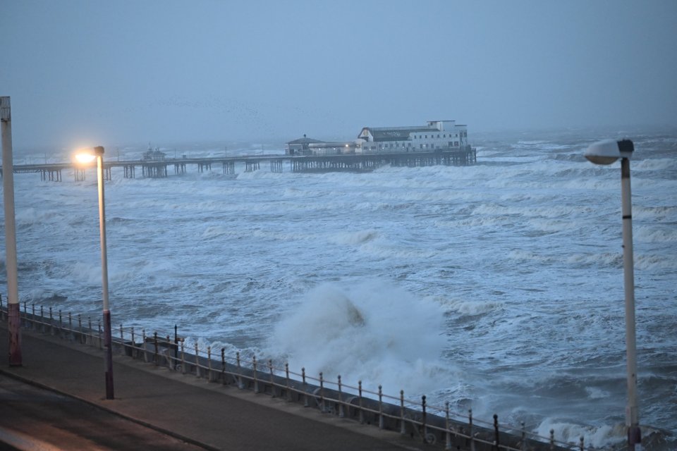 Storm waves crashing against Blackpool's North Pier.