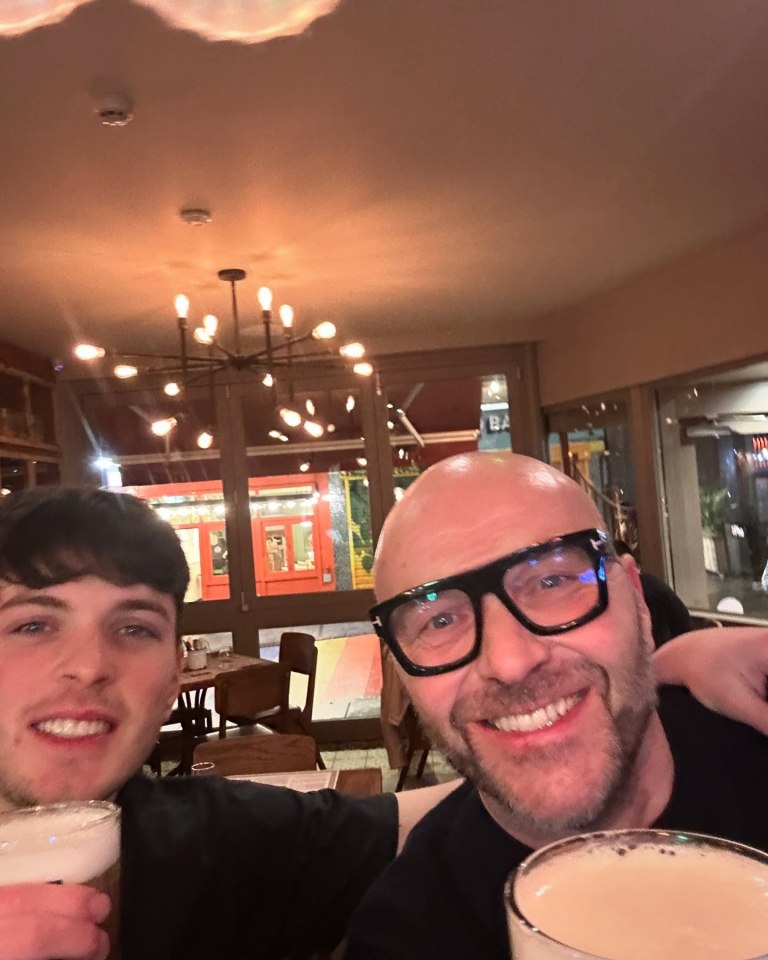 Simon Rimmer and his son enjoying beers together.