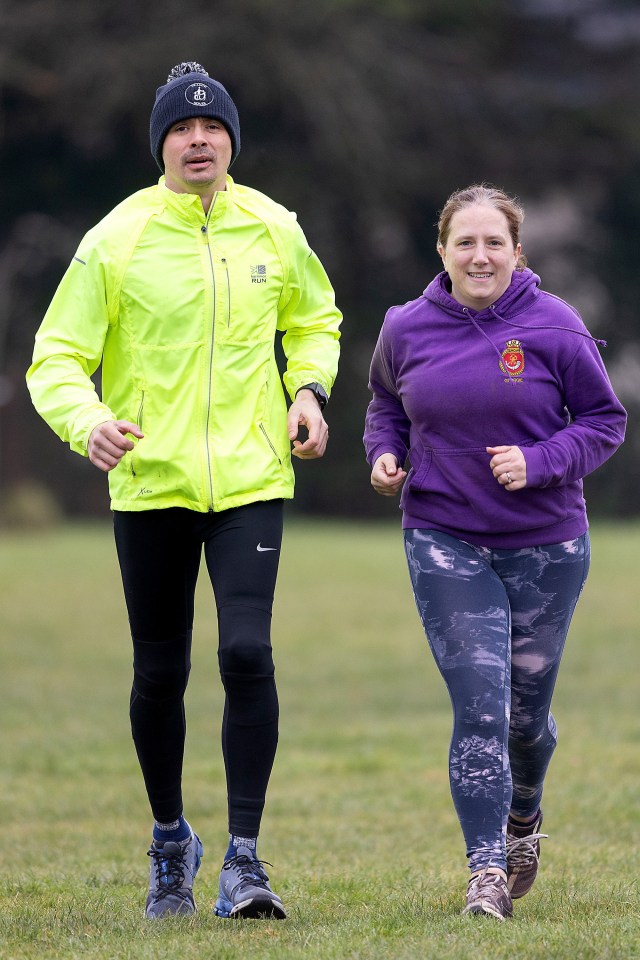 Parents jogging to raise money for charity.