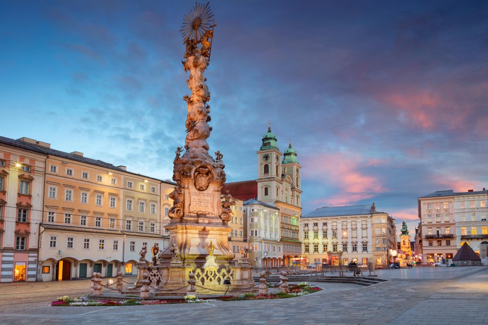 Linz, Austria main square at sunset.