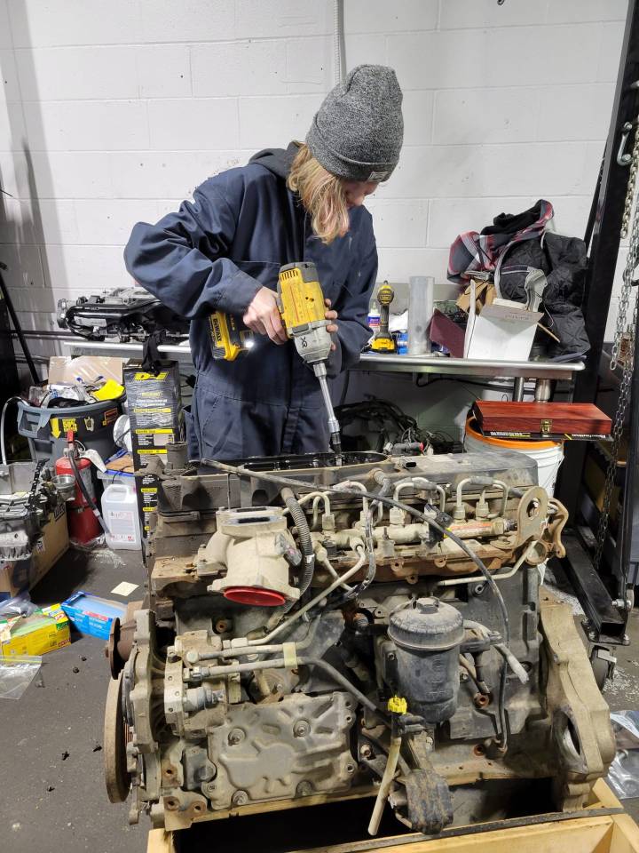 It's been hands on deck to fix up Tangaroa as daughter Izzy, 17, helps to disassemble the engine