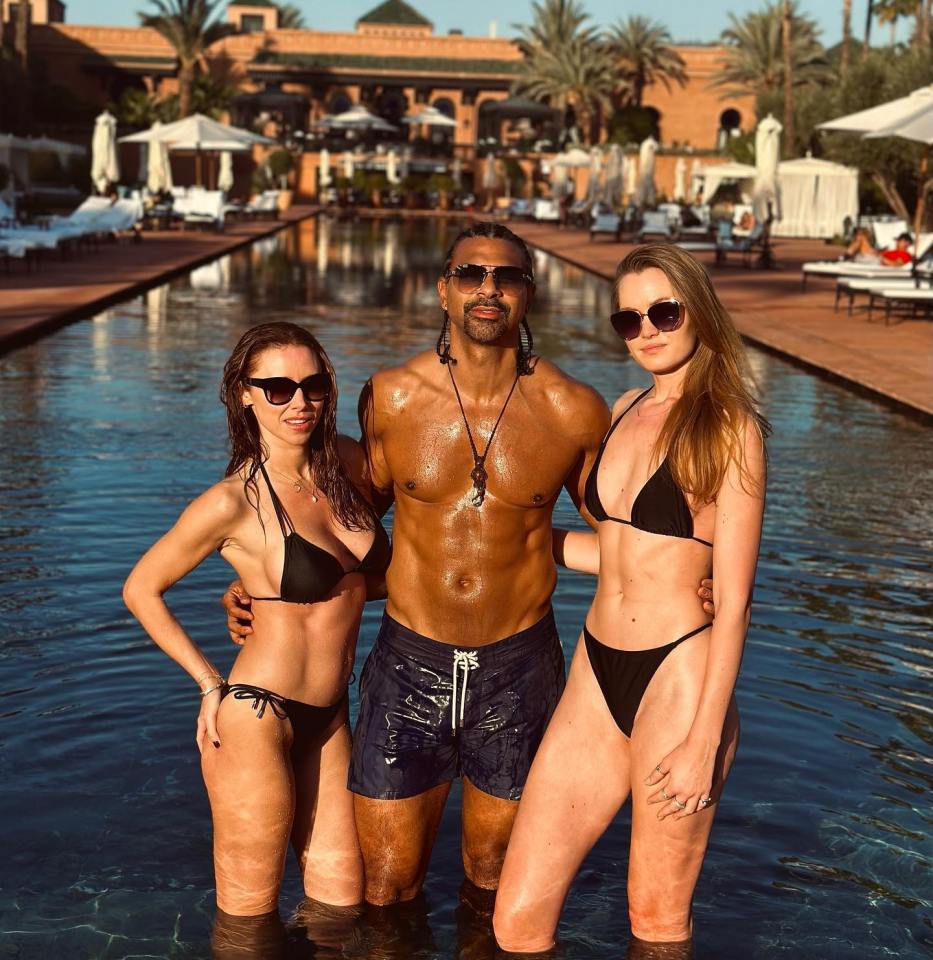 David Haye with two women in a pool.