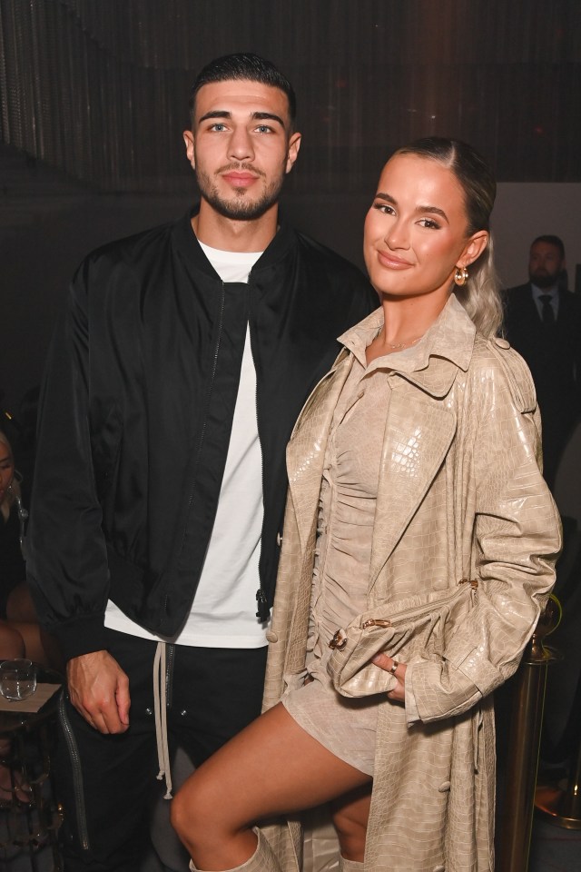 Tommy Fury and Molly-Mae Hague at a fashion show.