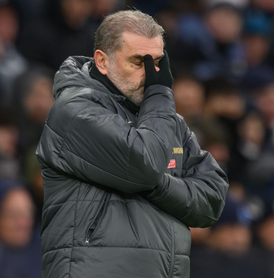 Ange Postecoglou, Tottenham Hotspur manager, looking distressed.