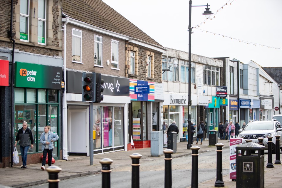 Street view of Blackwood shops and pedestrians.