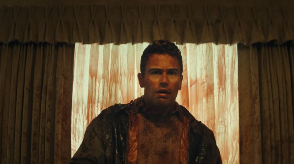 Bloody man in a trailer for Stephen King's excessively violent movie.