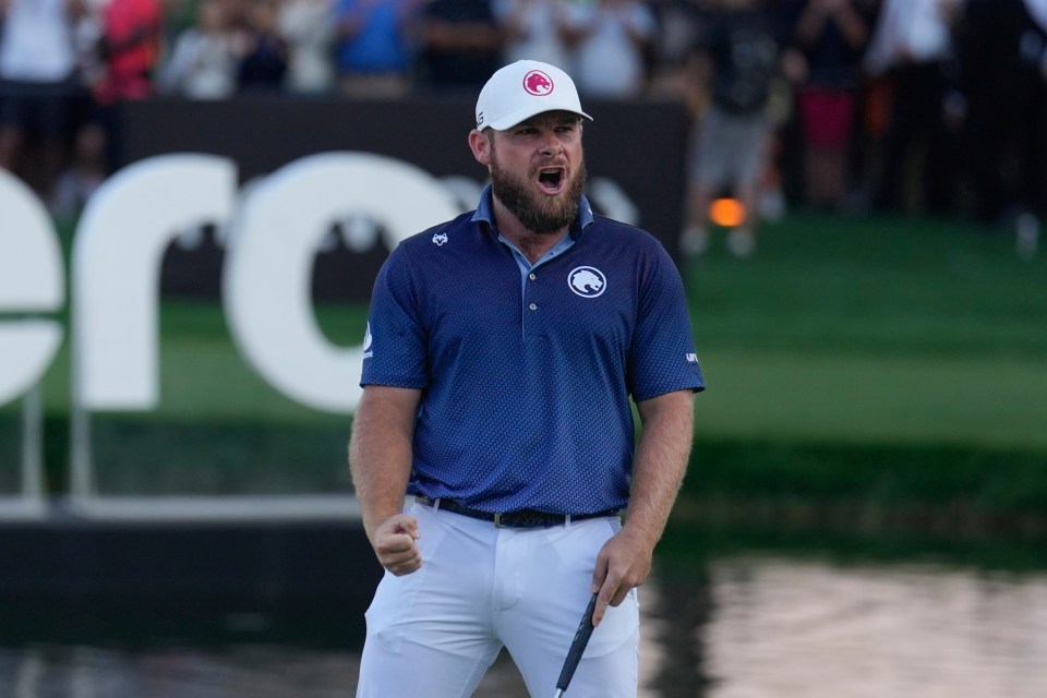 Tyrell Hatton celebrating a golf tournament win.