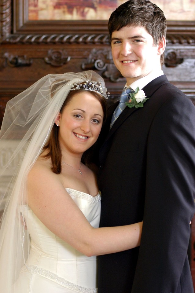 Photo of James Alexandrou and Natalie Cassidy as Martin and Sonia Fowler at a wedding.