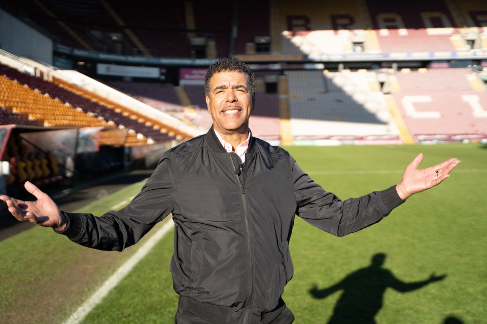 Chris Kamara at a football stadium.