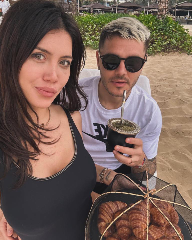 Wanda Nara and Mauro Icardi on a beach in Dubai, enjoying croissants and mate.