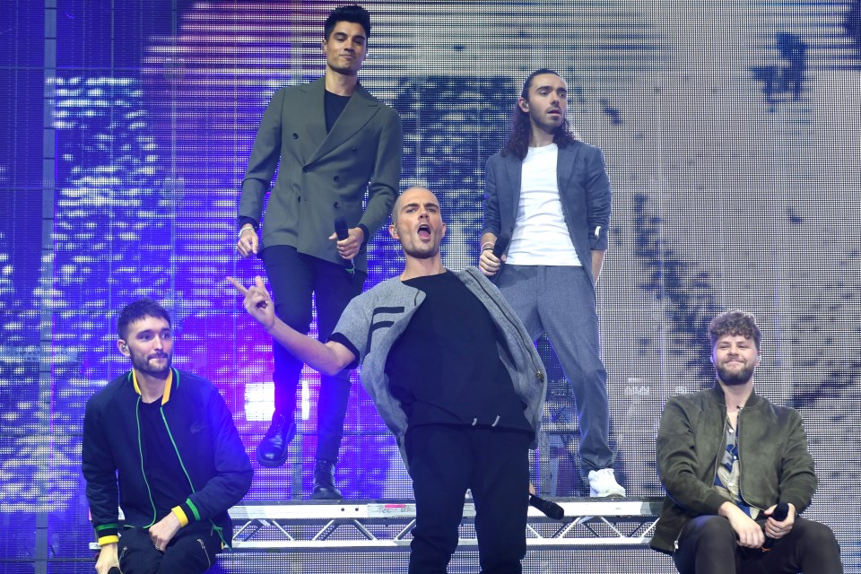 The Wanted performing on stage.