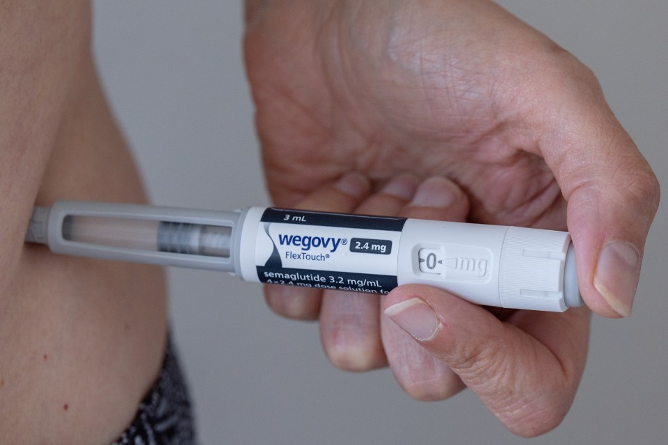 Person injecting Wegovy.