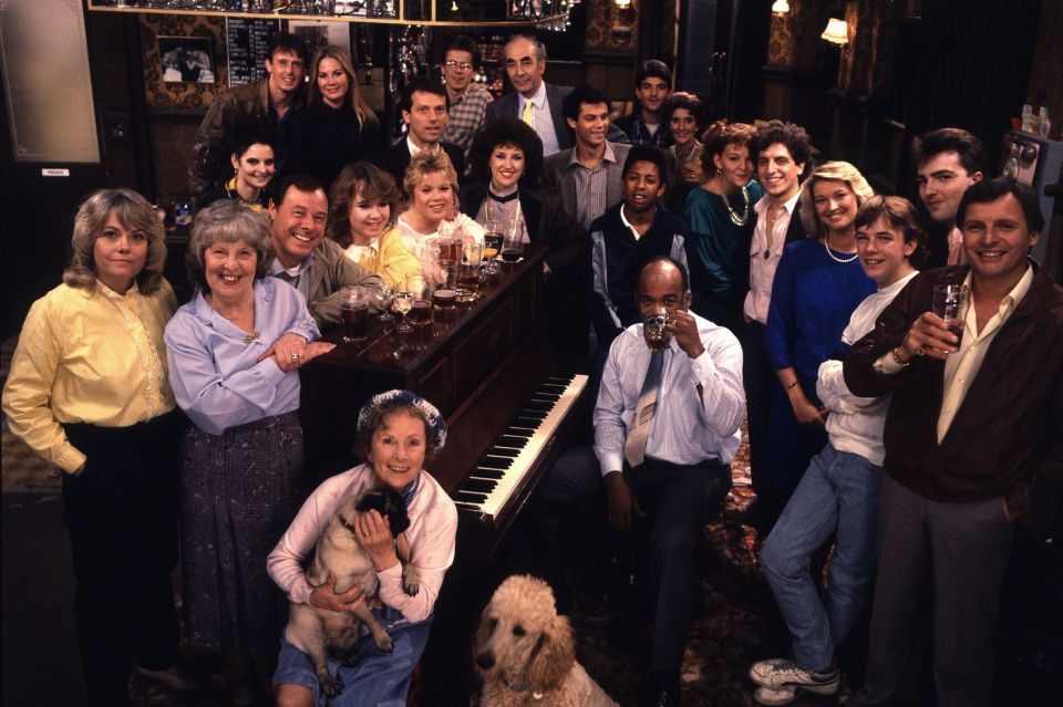 The original cast of EastEnders in the Queen Vic pub.